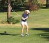 Lady golfer in action