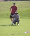 Studying a putt