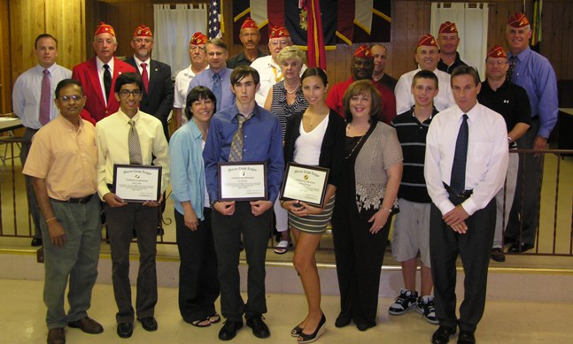 Scholarship recipients, family, and detachment members