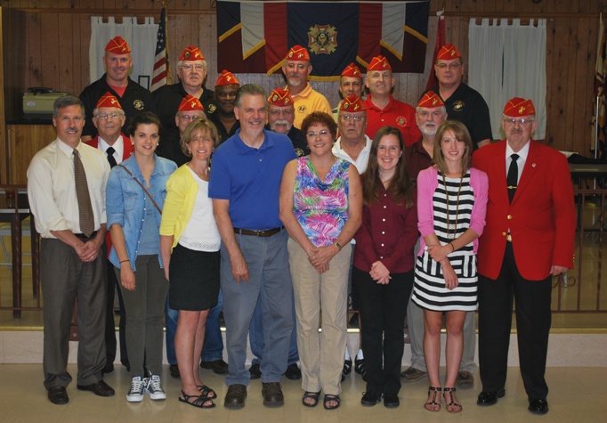 Scholarship recipients, family, and detachment members