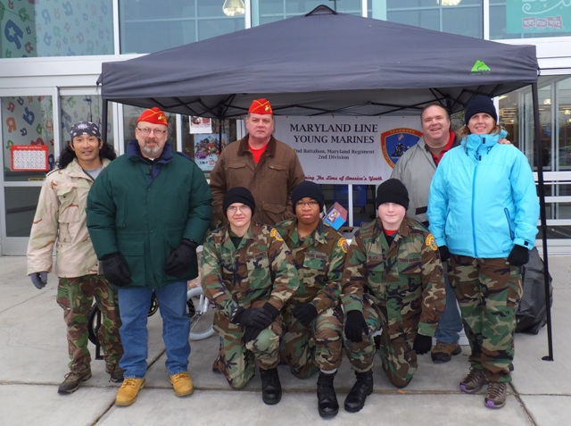 Detachment members and member of the Young Marines in front of Toys-R-Us in Columbia