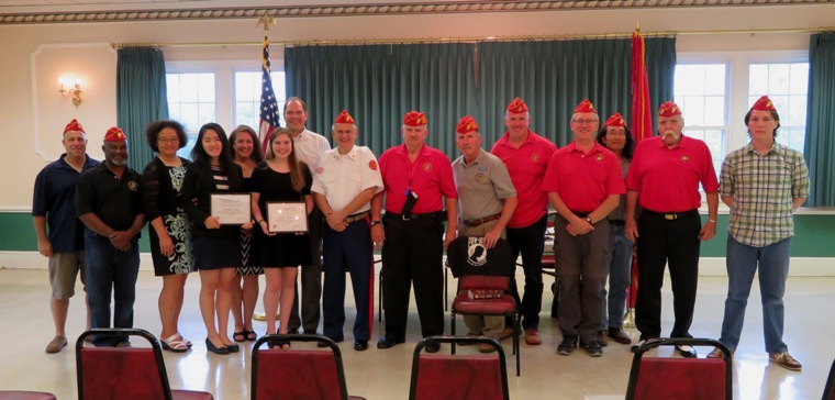 Scholarship recipients, family, and committee chairperson